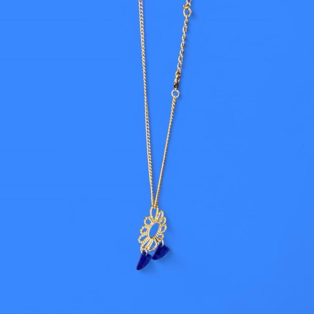 Silvertone flower necklace with blue stones